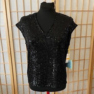 The holidays are almost here. CeCe Black Sequin Blouse. New with tags